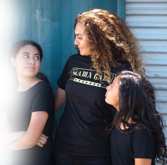 Sulma standing with children